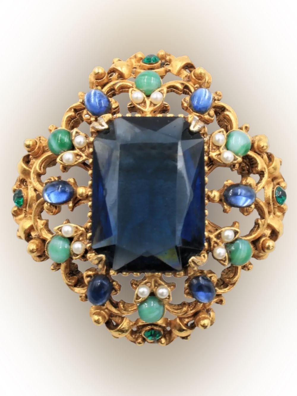 VTG~ FLORENZA Gold-tone Brooch with Deep Blue Centerstone and Green Accents